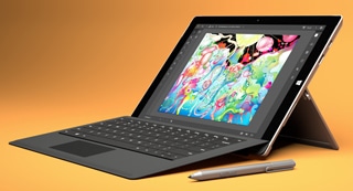 Blog image black microsoft surface pro 4 on a orange background