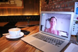 Blog image women on skype on a laptop in a coffee shop