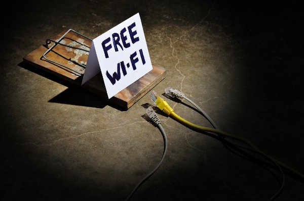 Blog image free wifi sign on mouse trap next to internet wires