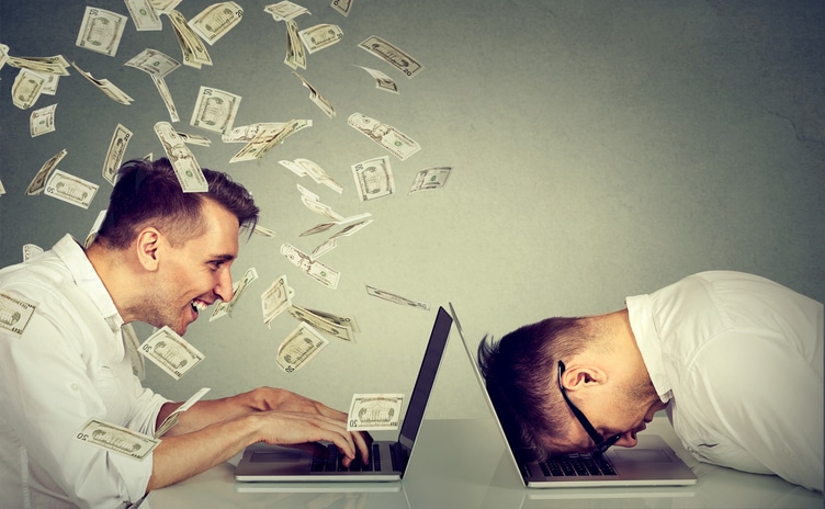 Blog image Stressed desperate burnout man resting sleeping on laptop sitting next to professional man under money dollar rain