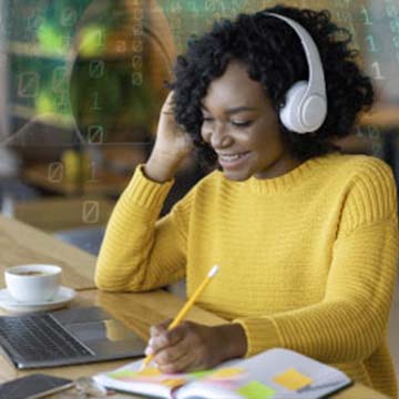 smiling woman with headphones on - ThrottleNEt newsletter